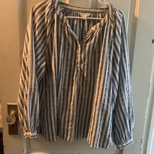 White and blue striped blouse.